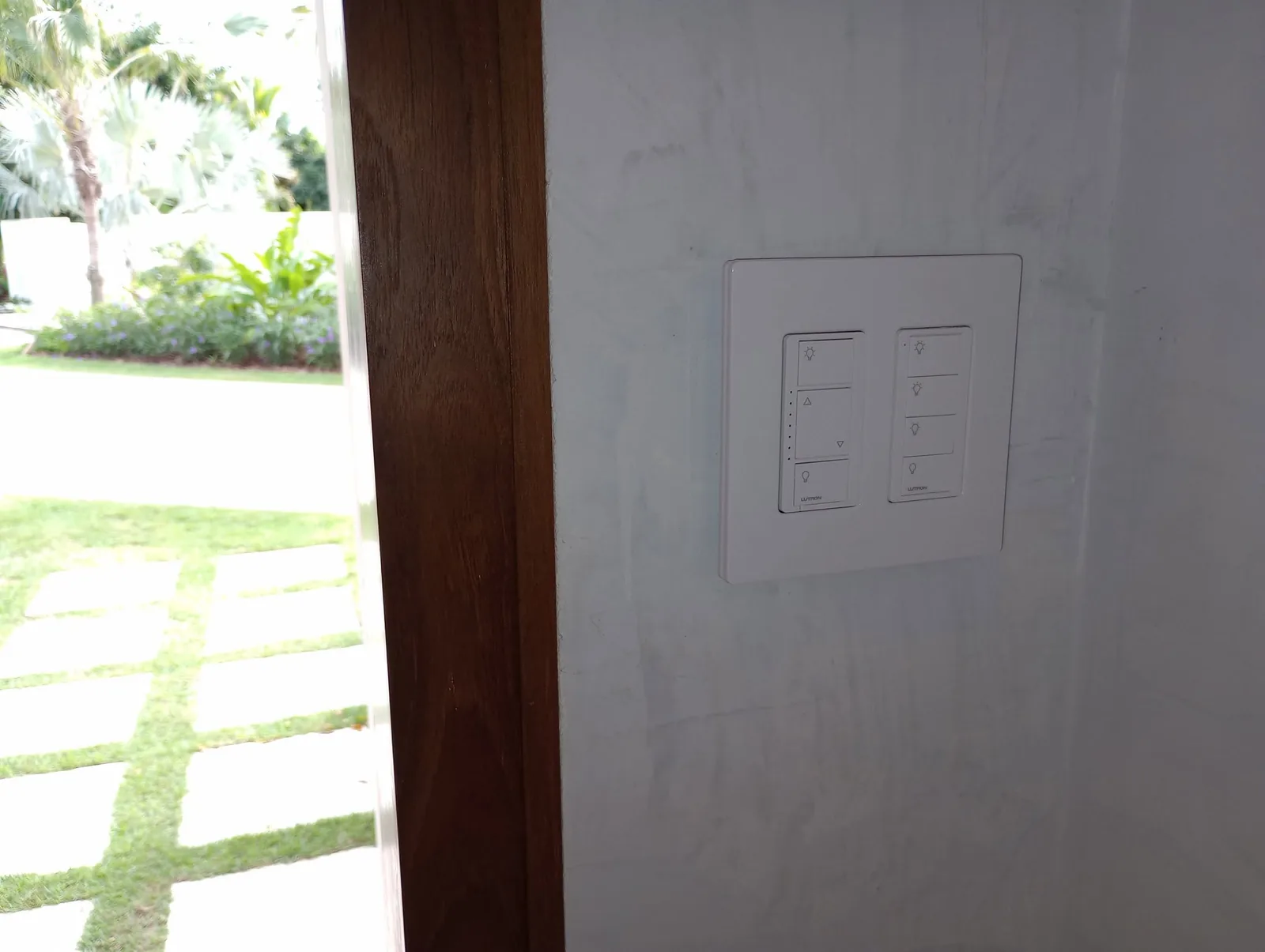 Wall controls positioned beside a residential entry