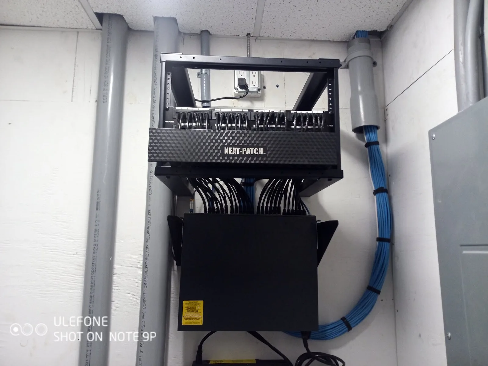 Organized equipment rack prepared for network installation