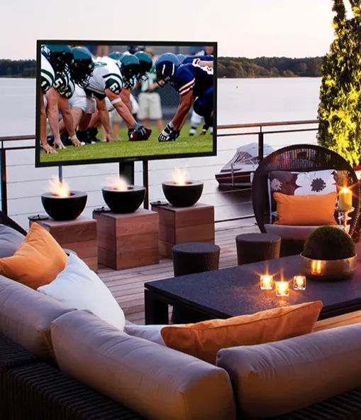 Outdoor entertainment area with an integrated display