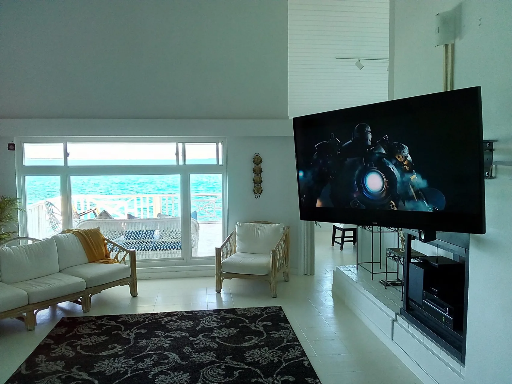 Television integrated into a bright contemporary living room